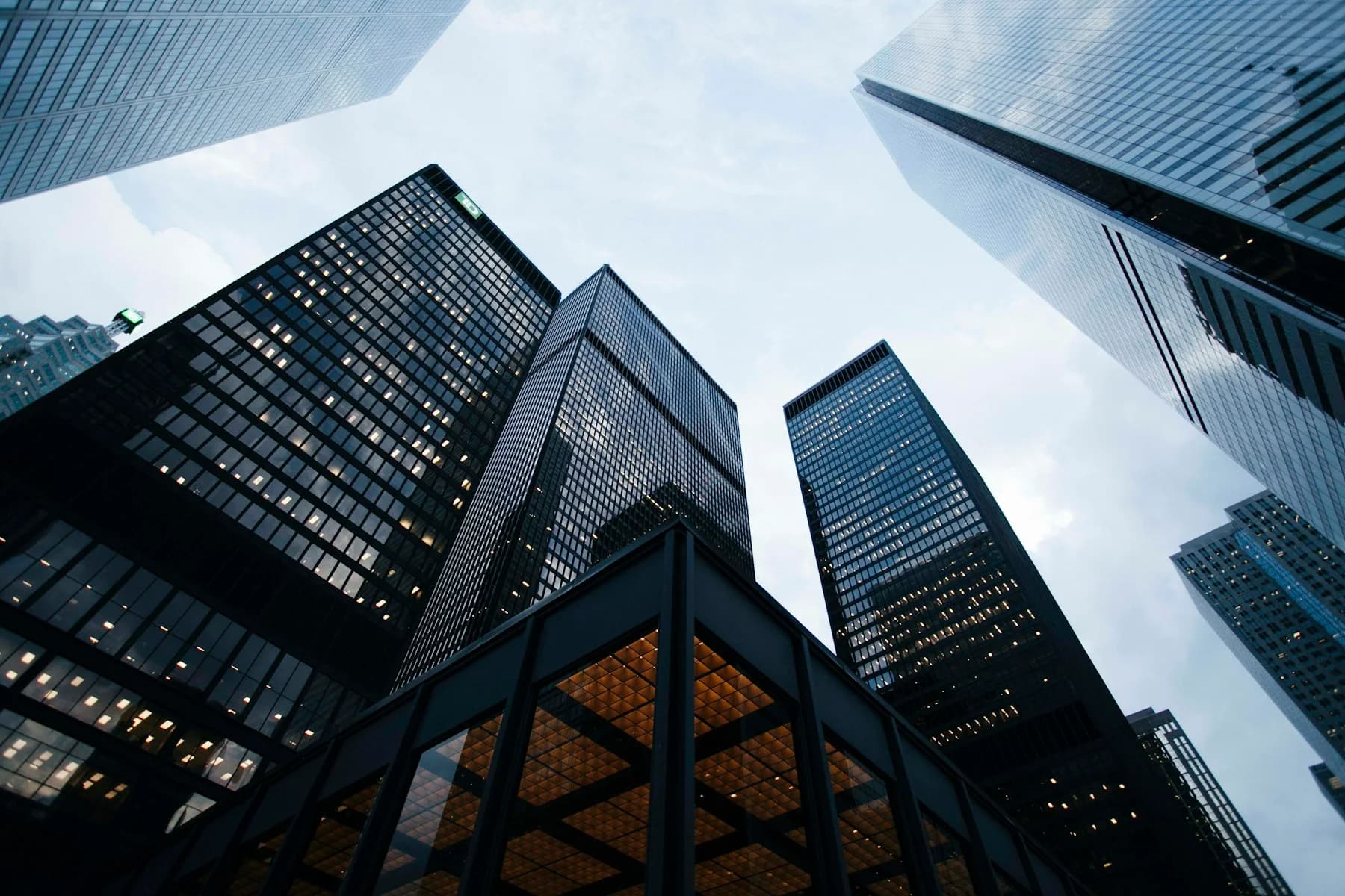 Modern business district representing Athena Group's long-term outlook